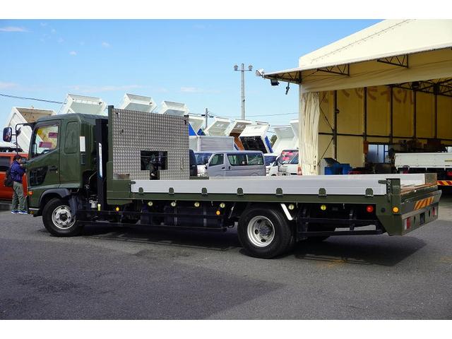 ヒノレンジャー 4トン ワイド ベッド付 重機運搬車 ウインチ ラジコン タダノ製ハイジャッキ 造りボディー 積載2050kg アユミ板掛け アルミブロック 鳥居シマ板張り 作業灯 坂道発進補助 衝突軽減ブレーキ 車線逸脱警報 6速MT セルフローダー 回送 寝台 ETC(6枚目)