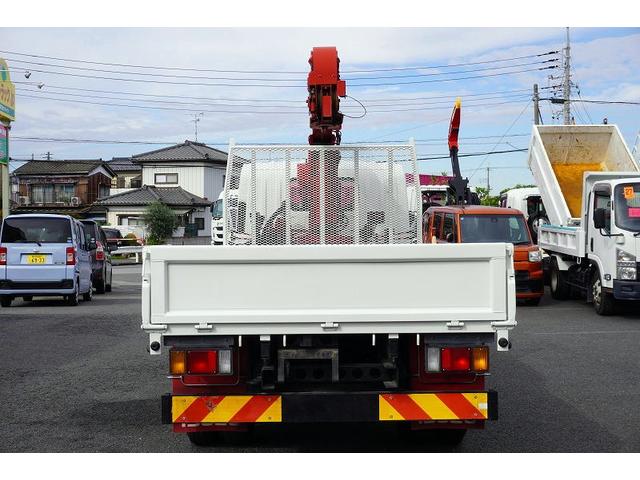 エルフトラック 標準ロング 4段クレーン 3トン積 ラジコン 2.93t吊 積載3000kg 古河ユニック製 フックイン セイコーラック 床フック3対 鳥居上部金網張り 左電格ミラー 坂道発進補助 ETC フォグランプ 6速MT(4枚目)