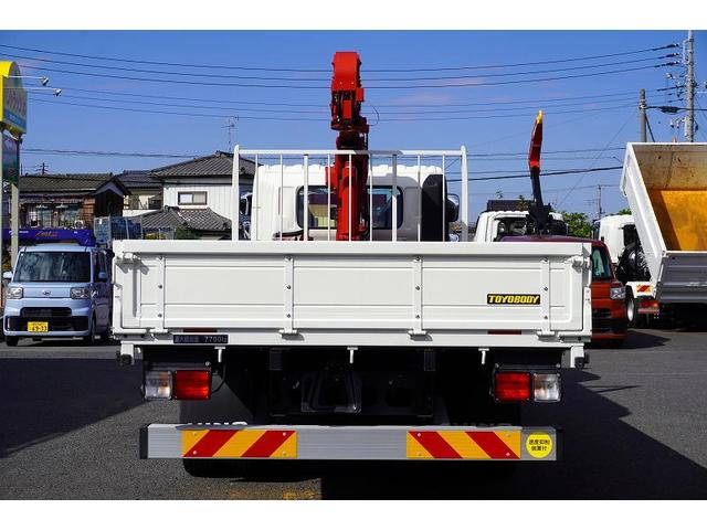 ヒノレンジャー 増トン 4段クレーン 7.7トン積 5.5m長 ラジコン 標準幅 ベッド付 積載7700kg 古河ユニック製 フックイン 2.93t吊 差違いアウトリガー 角足 セイコーラック 坂道発進補助 オートエアコン 衝突軽減ブレーキ 車線逸脱警報 6速MT(9枚目)