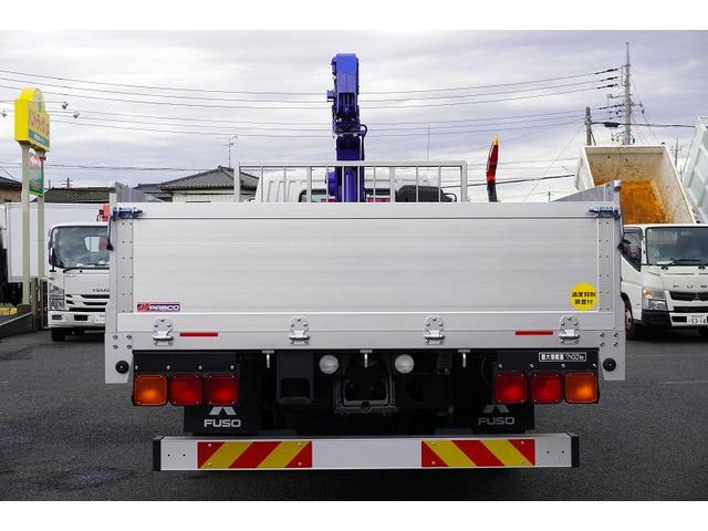 ファイター 増トン　ワイド　４段クレーン　アルミブロック　ラジコン　ベッド付　積載７４００ｋｇ　タダノ製　５．５ｍ長　フックイン　２．９３ｔ吊　差違いアウトリガー　落込フック５対　セイコーラック　坂道発進補助　メッキ　衝突軽減ブレーキ　車線逸脱警報　６速ＭＴ（4枚目）