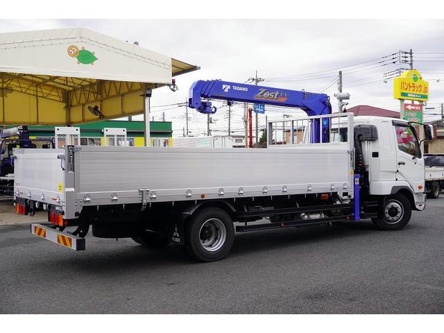 ファイター 増トン　ワイド　４段クレーン　アルミブロック　ラジコン　ベッド付　積載７４００ｋｇ　タダノ製　５．５ｍ長　フックイン　２．９３ｔ吊　差違いアウトリガー　落込フック５対　セイコーラック　坂道発進補助　メッキ　衝突軽減ブレーキ　車線逸脱警報　６速ＭＴ（9枚目）