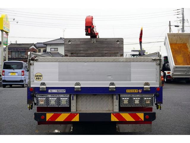 ヒノレンジャー 増トン ベッド 4段クレーン 7.1トン積 6m長 ラジコン 標準幅 積載7100kg 古河ユニック製 アルミブロック フックイン 2.93t吊 差違いアウトリガー 角足 セイコーラック アオリ上部プロテクター 鳥居板張り工具入れ 坂道発進補助 メッキ(4枚目)