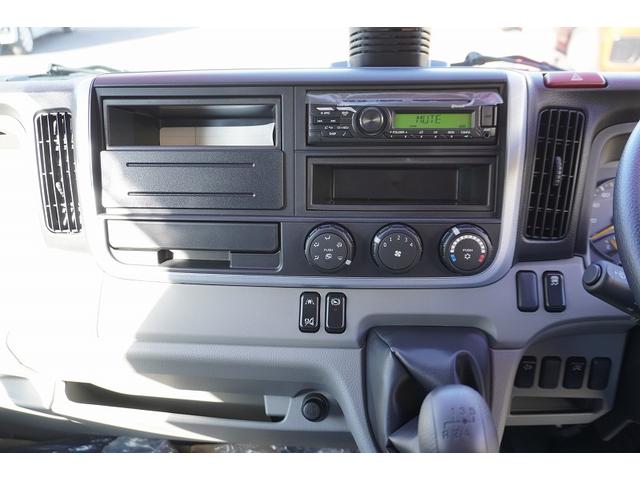 キャンター ロング　アルミバン　３トン積　サイドドア　ラッシング２段　標準幅　積載３０００ｋｇ　左電格ミラー　坂道発進補助　スマートキー　ＬＥＤヘッドライト　フォグランプ　９０度ストッパー　パブコ製　衝突軽減ブレーキ　車線逸脱警報　５速ＭＴ（25枚目）