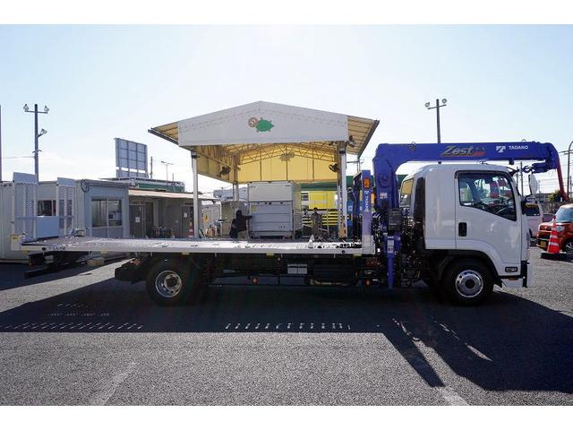 フォワード 増トン　標準幅　ベッド　３段クレーン　セーフティーローダー　ＡＴ車　タダノ製　車載専用　ラジコン　フックイン　２．９３ｔ吊　ウインチ　アオリ無し　床フック　荷台シマ板張り　坂道発進補助　左電動格納ミラー　社外ナビ　バックカメラ　アルミホイール（5枚目）