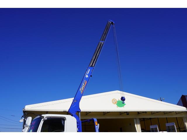 フォワード 増トン　標準幅　ベッド　３段クレーン　セーフティーローダー　ＡＴ車　タダノ製　車載専用　ラジコン　フックイン　２．９３ｔ吊　ウインチ　アオリ無し　床フック　荷台シマ板張り　坂道発進補助　左電動格納ミラー　社外ナビ　バックカメラ　アルミホイール（19枚目）
