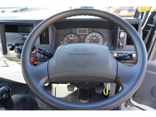 エルフトラック 標準幅　強化　ローダーダンプ　３トン積　スライド用ラジコン　新明和製　三方開　積載３０００ｋｇ　ダンプピン　ＥＴＣ　坂道発進補助　キーレス　６速ＭＴ（24枚目）