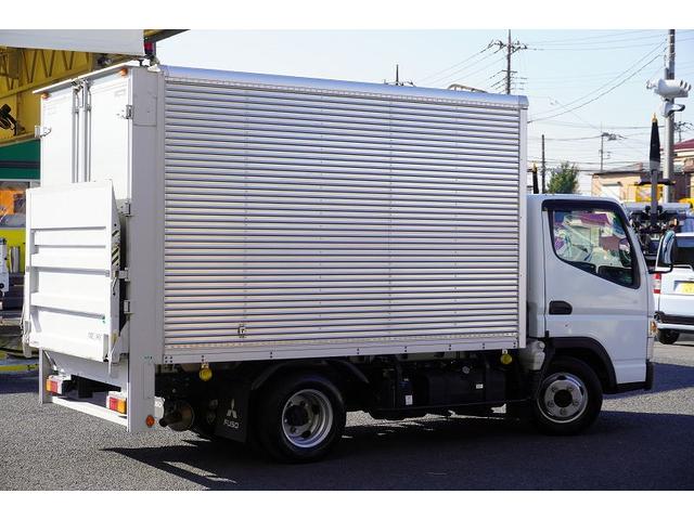 キャンター １０尺　アルミバン　２トン積　リア観音扉　垂直パワーゲート　積載２０００ｋｇ　ラッシング２段　左電格ミラー　バックカメラ　社外ナビ　ＥＴＣ　フォグランプ　パブコ製　ＡＴ　車両総重量４９５５ｋｇ　標準幅　ショート　リフト（6枚目）