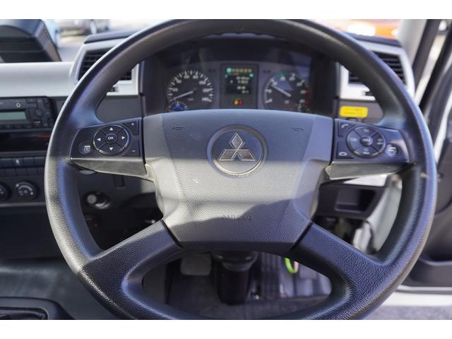 ファイター ４トン　フックロール　ツインシリンダー　キャブバックステップ　ベッドレス　極東製　積載３４５０ｋｇ　網工具入れ　ラジコン　ルーフキャリア　ＥＴＣ　坂道発進補助　衝突軽減ブレーキ　車線逸脱警報　６速ＭＴ　アームロール（25枚目）