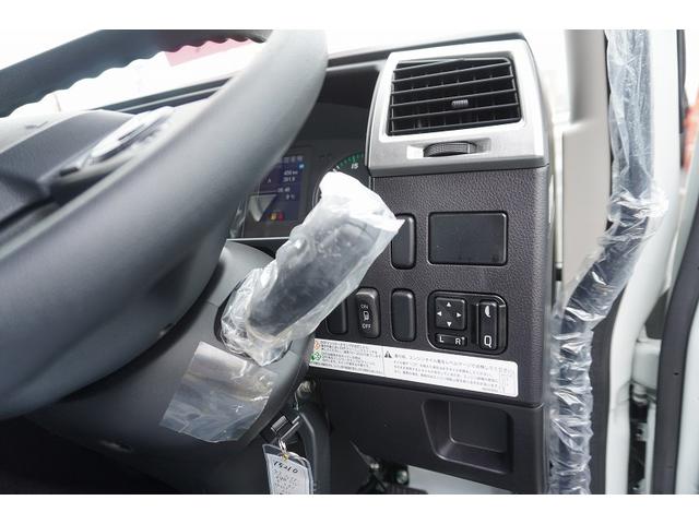 ファイター ４トン　ワイド　平ボディー　アルミブロック　リアエアサス　ベッド付　積載３４００ｋｇ　６．２ｍ長　五方開　東洋ボディー製造りボディー　アオリ上部プロテクター付　鳥居シマ板張り　落込フック　バックカメラ　ＥＴＣ　坂道発進補助　メッキ　アルミホイール　融雪仕様（19枚目）