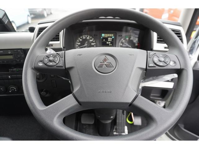 ファイター ４トン　ワイド　平ボディー　アルミブロック　リアエアサス　ベッド付　積載３４００ｋｇ　６．２ｍ長　五方開　東洋ボディー製造りボディー　アオリ上部プロテクター付　鳥居シマ板張り　落込フック　バックカメラ　ＥＴＣ　坂道発進補助　メッキ　アルミホイール　融雪仕様（32枚目）