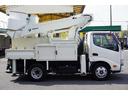 デュトロ 高所作業車　タダノ製ＡＴ－１００ＴＴＥ　最大地上高９．９ｍ　ＦＲＰバケット　バケット積載荷重２００ｋｇ　積載３００ｋｇ　工具入れ　ブーム自動格納　ジョイスティックタイプ　アワーメーター１５４０ｈ　社外ナビ　フォグランプ　左電格ミラー　電気工事仕様　ＡＴ（8枚目）