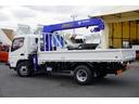 キャンター ワイドロング 4段クレーン 3.35t ラジコン 2.9t吊 積載3350kg タダノ製 フックイン バックカメラ ETC 坂道発進補助 左電格ミラー LEDヘッドライト フォグランプ スマートキー 衝突軽減ブレーキ 車線逸脱警報 5速MT(7枚目)