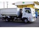 ファイター ４トン　アームロール　新明和　３．６５ｔ積　ツインシリンダー　ベッドレス　積載３６５０ｋｇ　キャブバックステップ　コンテナ付　網工具入れ　坂道発進補助　ＥＴＣ　６速ＭＴ（7枚目）