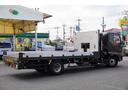 4トン ワイド ベッド付 重機運搬車 ウインチ ラジコン タダノ製ハイジャッキ 造りボディー 積載2050kg アユミ板掛け アルミブロック 鳥居シマ板張り 作業灯 坂道発進補助 衝突軽減ブレーキ 車線逸脱警報 6速MT セルフローダー 回送 寝台 ETC(9枚目)