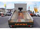 4トン ワイド ベッド付 重機運搬車 ウインチ ラジコン タダノ製ハイジャッキ 造りボディー 積載2050kg アユミ板掛け アルミブロック 鳥居シマ板張り 作業灯 坂道発進補助 衝突軽減ブレーキ 車線逸脱警報 6速MT セルフローダー 回送 寝台 ETC(43枚目)