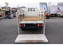 ショート　平ボディー　垂直パワーゲート　３トン　五方開　標準幅　積載２９５０ｋｇ　前方２段アオリ　後方アオリパイプ欄干　荷台鉄板張り　鳥居下部シマ板張り　左電格ミラー　坂道発進補助　バックカメラ　ＥＴＣ　ナビ　フォグ　６速ＭＴ　プロパンガス運搬　リフト（36枚目）