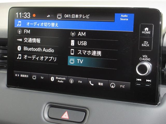 ｅ：ＨＥＶＺ　ホンダコネクトディスプレイＢｌｕｅｔｏｏｔｈドラレコＥＴＣ　パーキングセンサー　ＶＳＡ　スマ－トキ－　ＡＡＣ　Ｒカメ　１オ－ナ－　シ－トヒ－タ－　ＬＥＤライト　盗難防止装置　フルセグＴＶ　記録簿(7枚目)