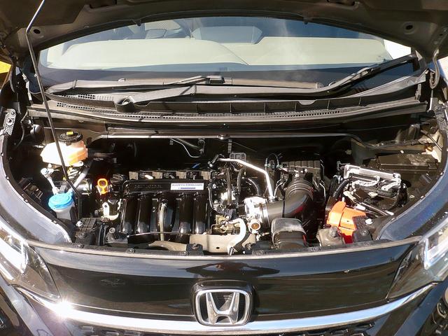 フリードハイブリッド ハイブリッド・Ｇホンダセンシング　社外メモリーナビ　地ＤＴＶ　Ｂカメラ　ＣＤ録＆ＤＶＤ　Ｂｌｕｅｔｏｏｔｈ電話＆音楽　ＥＴＣ　スマートキー　前席Ｓヒーター　フリップダウンモニター　両側自動ドア　レーダークルコン　ＬＥＤライト　衝突軽減（12枚目）