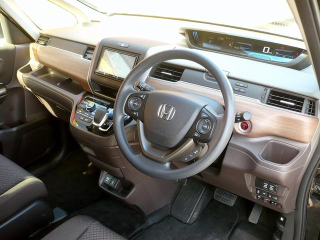 フリードハイブリッド ハイブリッド・Ｇホンダセンシング　社外メモリーナビ　地ＤＴＶ　Ｂカメラ　ＣＤ録＆ＤＶＤ　Ｂｌｕｅｔｏｏｔｈ電話＆音楽　ＥＴＣ　スマートキー　前席Ｓヒーター　フリップダウンモニター　両側自動ドア　レーダークルコン　ＬＥＤライト　衝突軽減（21枚目）