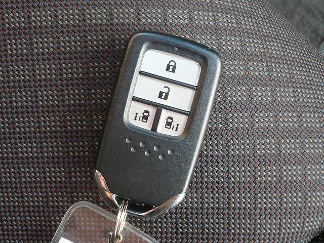 フリードハイブリッド ハイブリッド・Ｇホンダセンシング　社外メモリーナビ　地ＤＴＶ　Ｂカメラ　ＣＤ録＆ＤＶＤ　Ｂｌｕｅｔｏｏｔｈ電話＆音楽　ＥＴＣ　スマートキー　前席Ｓヒーター　フリップダウンモニター　両側自動ドア　レーダークルコン　ＬＥＤライト　衝突軽減（28枚目）