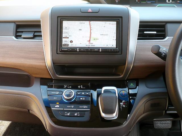 フリードハイブリッド ハイブリッド・Ｇホンダセンシング　社外メモリーナビ　地ＤＴＶ　Ｂカメラ　ＣＤ録＆ＤＶＤ　Ｂｌｕｅｔｏｏｔｈ電話＆音楽　ＥＴＣ　スマートキー　前席Ｓヒーター　フリップダウンモニター　両側自動ドア　レーダークルコン　ＬＥＤライト　衝突軽減（35枚目）