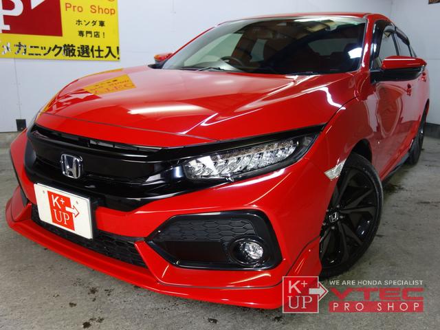 ハッチバック ホンダセンシング 1オーナー 禁煙車 無限フロントリップ 無限バイザー 無限スポーツマット 純正ナビ バックカメラ フルセグ ドラレコ ETC シートヒーター 6速マニュアル 記録簿(2枚目)