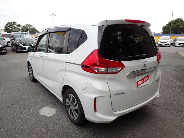 フリードハイブリッド ハイブリッド・Ｇホンダセンシング　後期型　純正９インチメモリーナビ　フルセグＴＶ　Ｂｌｕｅｔｏｏｔｈ　ＥＴＣ　両側自動ドア　スマートキー　オートＡＣ　クルコン　ホンダセンシング　ＬＥＤライト　純正アルミ　６人乗り（5枚目）