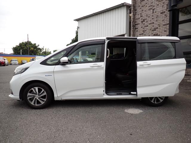 フリードハイブリッド ハイブリッド・Ｇホンダセンシング　後期型　純正９インチメモリーナビ　フルセグＴＶ　Ｂｌｕｅｔｏｏｔｈ　ＥＴＣ　両側自動ドア　スマートキー　オートＡＣ　クルコン　ホンダセンシング　ＬＥＤライト　純正アルミ　６人乗り（6枚目）