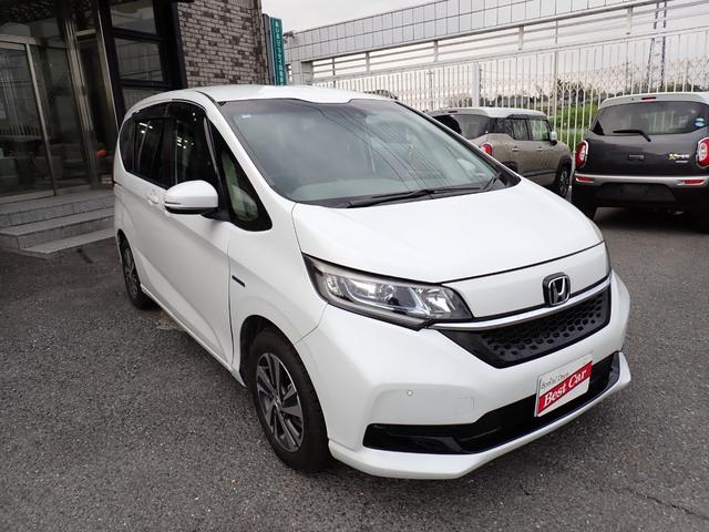 フリードハイブリッド ハイブリッド・Ｇホンダセンシング　後期型　純正９インチメモリーナビ　フルセグＴＶ　Ｂｌｕｅｔｏｏｔｈ　ＥＴＣ　両側自動ドア　スマートキー　オートＡＣ　クルコン　ホンダセンシング　ＬＥＤライト　純正アルミ　６人乗り（7枚目）