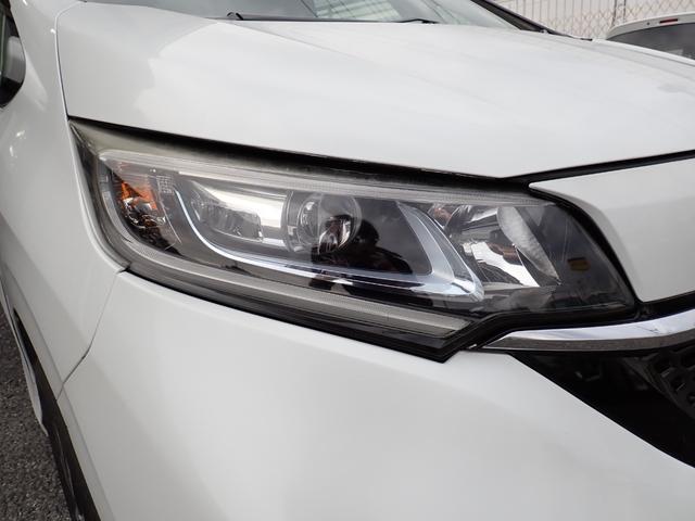 フリードハイブリッド ハイブリッド・Ｇホンダセンシング　後期型　純正９インチメモリーナビ　フルセグＴＶ　Ｂｌｕｅｔｏｏｔｈ　ＥＴＣ　両側自動ドア　スマートキー　オートＡＣ　クルコン　ホンダセンシング　ＬＥＤライト　純正アルミ　６人乗り（8枚目）