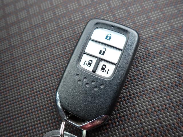 フリードハイブリッド ハイブリッド・Ｇホンダセンシング　後期型　純正９インチメモリーナビ　フルセグＴＶ　Ｂｌｕｅｔｏｏｔｈ　ＥＴＣ　両側自動ドア　スマートキー　オートＡＣ　クルコン　ホンダセンシング　ＬＥＤライト　純正アルミ　６人乗り（27枚目）