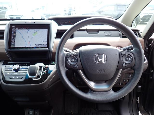 フリードハイブリッド ハイブリッド・Ｇホンダセンシング　後期型　ワンオーナー　純正９インチメモリーナビＴＶ　Ｂｌｕｅｔｏｏｔｈ　Ｂカメラ　ＥＴＣ　両側自動ドア　スマートキー　クルコン　ホンダセンシング　Ｃパッケージ　ＬＥＤライト　純正アルミ　６人乗り（17枚目）