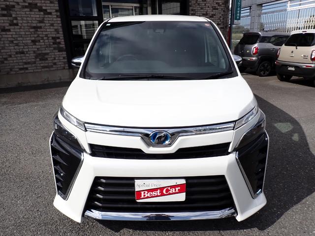 ヴォクシー ハイブリッドZS 煌 後期型 純正9インチナビTV Bluetooth フリップダウンモニター Bカメラ ETC 両側自動ドア スマートキー トヨタセーフティーセンス クルコン LEDライト フォグ 純正アルミ 7人乗り(2枚目)