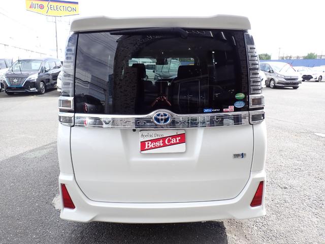 ヴォクシー ハイブリッドZS 煌 後期型 純正9インチナビTV Bluetooth フリップダウンモニター Bカメラ ETC 両側自動ドア スマートキー トヨタセーフティーセンス クルコン LEDライト フォグ 純正アルミ 7人乗り(4枚目)