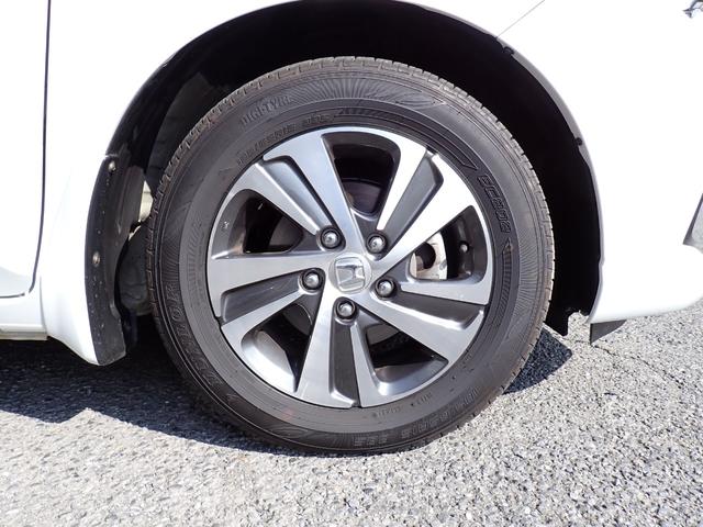 フリード G・ホンダセンシング 後期型 メモリーナビ Bluetooth ETC 両側自動ドア ホンダセンシング Sパッケージ スマートキー オートAC クルコン LEDライト 純正アルミ 7人乗り(9枚目)