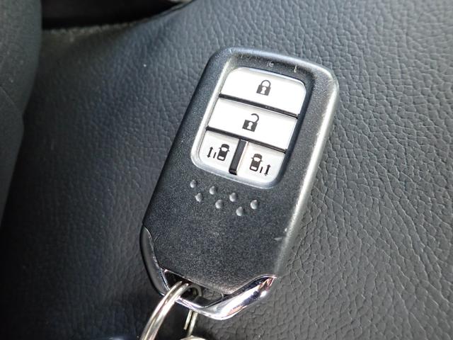 フリード G・ホンダセンシング 後期型 メモリーナビ Bluetooth ETC 両側自動ドア ホンダセンシング Sパッケージ スマートキー オートAC クルコン LEDライト 純正アルミ 7人乗り(26枚目)