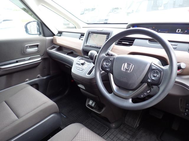 フリード G・ホンダセンシング 後期型 純正メモリーナビ 両側自動ドア ホンダセンシング Cパッケージ フルセグTV Bluetooth Bカメラ ETC スマートキー オートAC クルコン ドアバイザー 7人乗り(12枚目)