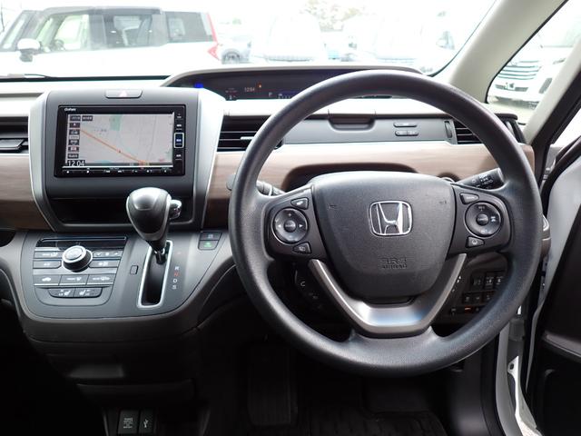 フリード G・ホンダセンシング 後期型 純正メモリーナビ 両側自動ドア ホンダセンシング Cパッケージ フルセグTV Bluetooth Bカメラ ETC スマートキー オートAC クルコン ドアバイザー 7人乗り(17枚目)