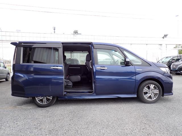 ステップワゴンスパーダ スパーダハイブリッド　Ｇ　ホンダセンシング　純正メモリーナビ　フルセグＴＶ　Ｂｌｕｅｔｏｏｔｈ　ＥＴＣ　両側自動ドア　スマートキー　オートＡＣ　クルコン　ホンダセンシング　ＬＥＤライト　純正アルミ　７人乗り（6枚目）