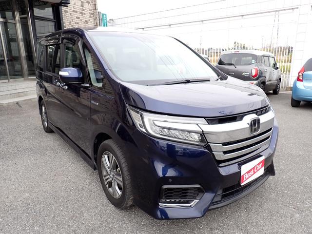 ステップワゴンスパーダ スパーダハイブリッド　Ｇ　ホンダセンシング　純正メモリーナビ　フルセグＴＶ　Ｂｌｕｅｔｏｏｔｈ　ＥＴＣ　両側自動ドア　スマートキー　オートＡＣ　クルコン　ホンダセンシング　ＬＥＤライト　純正アルミ　７人乗り（7枚目）