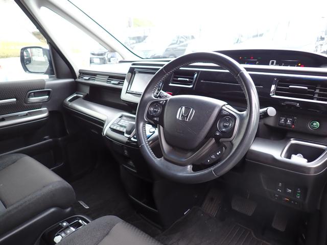 ステップワゴンスパーダ スパーダハイブリッド　Ｇ　ホンダセンシング　純正メモリーナビ　フルセグＴＶ　Ｂｌｕｅｔｏｏｔｈ　ＥＴＣ　両側自動ドア　スマートキー　オートＡＣ　クルコン　ホンダセンシング　ＬＥＤライト　純正アルミ　７人乗り（12枚目）
