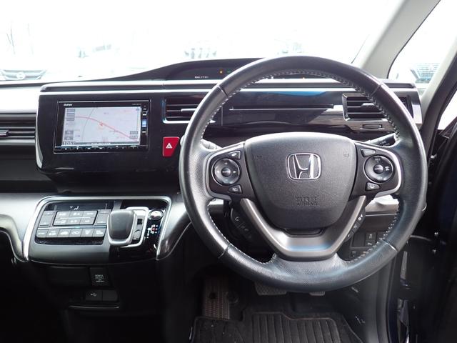 ステップワゴンスパーダ スパーダハイブリッド　Ｇ　ホンダセンシング　純正メモリーナビ　フルセグＴＶ　Ｂｌｕｅｔｏｏｔｈ　ＥＴＣ　両側自動ドア　スマートキー　オートＡＣ　クルコン　ホンダセンシング　ＬＥＤライト　純正アルミ　７人乗り（17枚目）