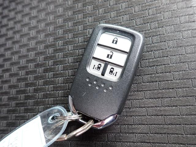 ステップワゴンスパーダ スパーダハイブリッド　Ｇ　ホンダセンシング　純正メモリーナビ　フルセグＴＶ　Ｂｌｕｅｔｏｏｔｈ　ＥＴＣ　両側自動ドア　スマートキー　オートＡＣ　クルコン　ホンダセンシング　ＬＥＤライト　純正アルミ　７人乗り（27枚目）