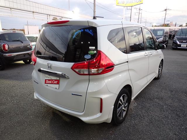 フリードハイブリッド ハイブリッド・Gホンダセンシング 後期型 純正メモリーナビTV Bluetooth ETC 両側自動ドア S・Cパッケージ スマートキー シートヒーター クルコン ホンダセンシング LEDライト 純正アルミ 6人乗り(5枚目)