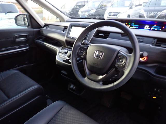 フリードハイブリッド ハイブリッド・Gホンダセンシング 後期型 純正メモリーナビTV Bluetooth ETC 両側自動ドア S・Cパッケージ スマートキー シートヒーター クルコン ホンダセンシング LEDライト 純正アルミ 6人乗り(12枚目)