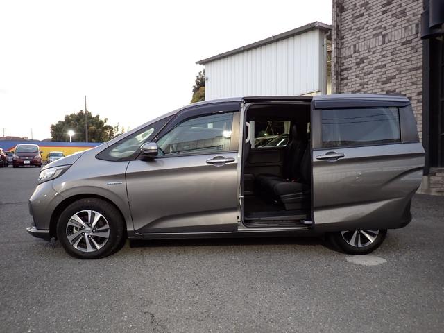 フリードハイブリッド ハイブリッド・Ｇホンダセンシング　後期型　純正メモリーナビＴＶ　Ｂｌｕｅｔｏｏｔｈ　ＥＴＣ　両側自動ドア　Ｓ・Ｃパッケージ　スマートキー　オートＡＣ　シートヒーター　ホンダセンシング　ＬＥＤライト　純正アルミ　６人乗り（6枚目）