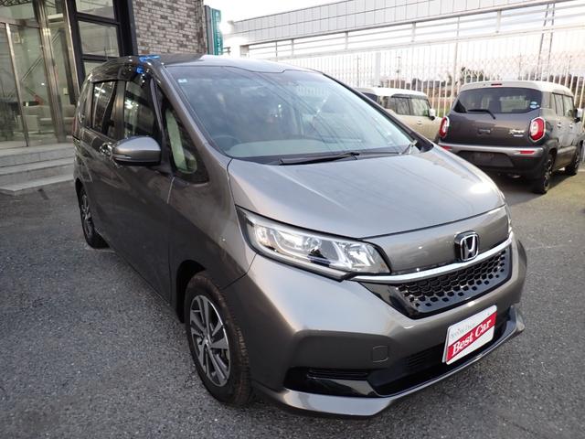 フリードハイブリッド ハイブリッド・Ｇホンダセンシング　後期型　純正メモリーナビＴＶ　Ｂｌｕｅｔｏｏｔｈ　ＥＴＣ　両側自動ドア　Ｓ・Ｃパッケージ　スマートキー　オートＡＣ　シートヒーター　ホンダセンシング　ＬＥＤライト　純正アルミ　６人乗り（7枚目）