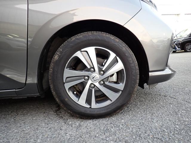 フリードハイブリッド ハイブリッド・Ｇホンダセンシング　後期型　純正メモリーナビＴＶ　Ｂｌｕｅｔｏｏｔｈ　ＥＴＣ　両側自動ドア　Ｓ・Ｃパッケージ　スマートキー　オートＡＣ　シートヒーター　ホンダセンシング　ＬＥＤライト　純正アルミ　６人乗り（10枚目）