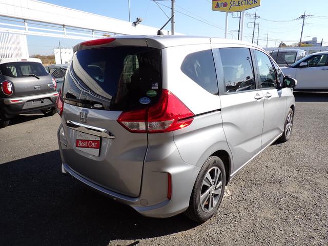 フリード Ｇ・ホンダセンシング　後期型　純正メモリーナビ　フルセグＴＶ　Ｂｌｕｅｔｏｏｔｈ　ＥＴＣ　両側自動ドア　ホンダセンシング　バックカメラ　Ｓ・Ｃパッケージ　スマートキー　ＬＥＤライト　フォグライト　純正アルミ　７人乗り（5枚目）