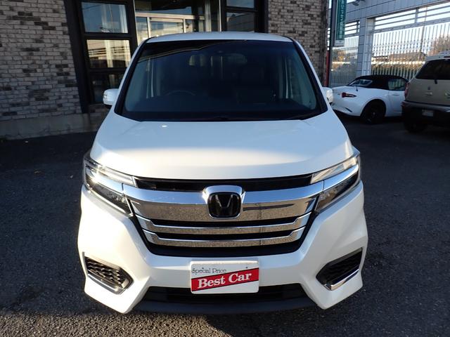 ステップワゴンスパーダ スパーダハイブリッド　Ｇ・ＥＸ　ホンダセンシング　純正９インチメモリーナビＴＶ　フリップダウンモニター　両側自動ドア　Ｂｌｕｅｔｏｏｔｈ　Ｂカメラ　ＥＴＣ　スマートキー　クルコン　ホンダセンシング　ＬＥＤライト　純正アルミ　７人乗り（2枚目）